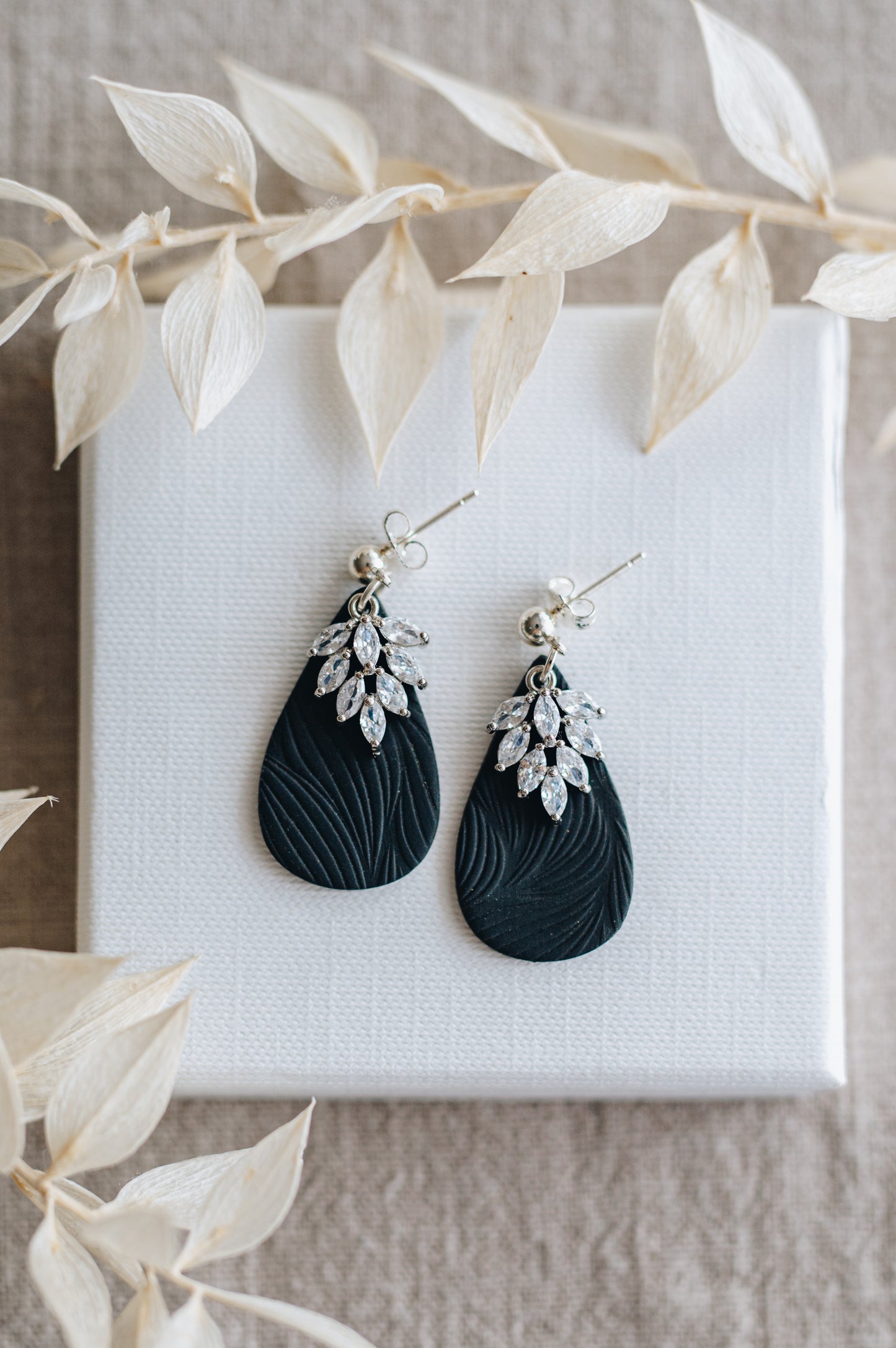 "Alight" earrings with crystal plates