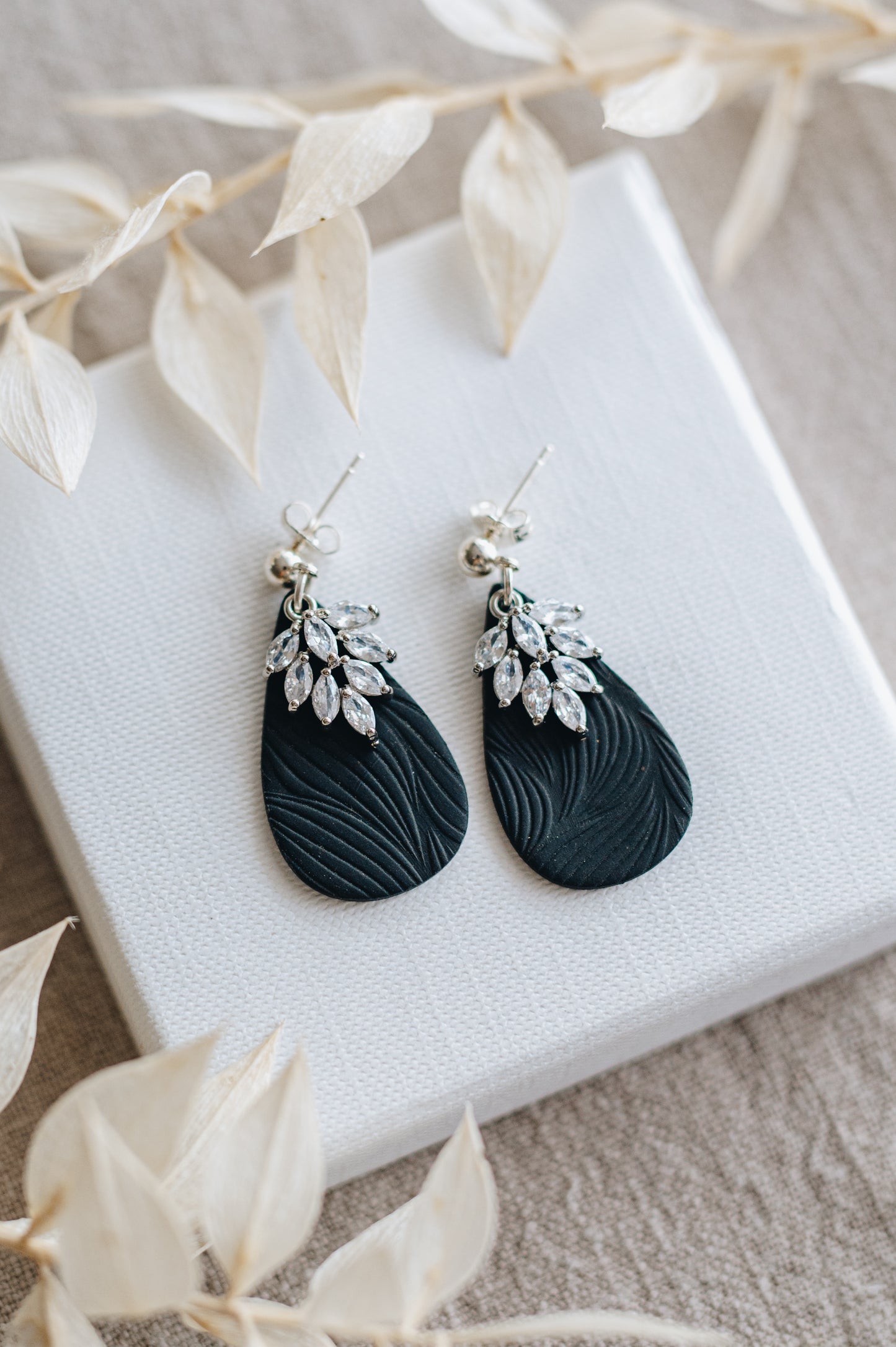 "Alight" earrings with crystal plates
