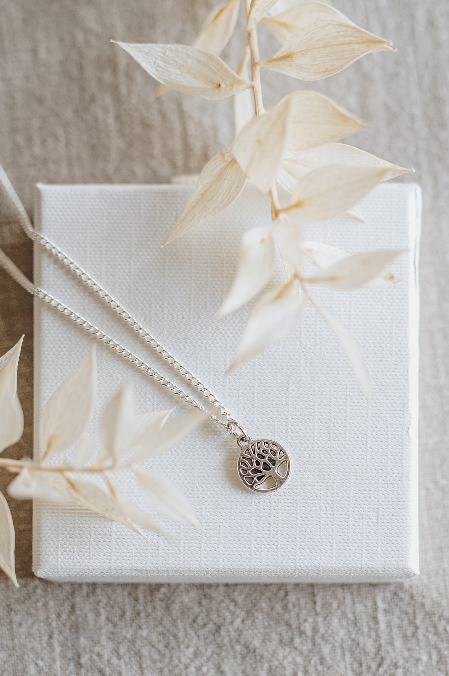 "Awake" necklace with tree of life pendant