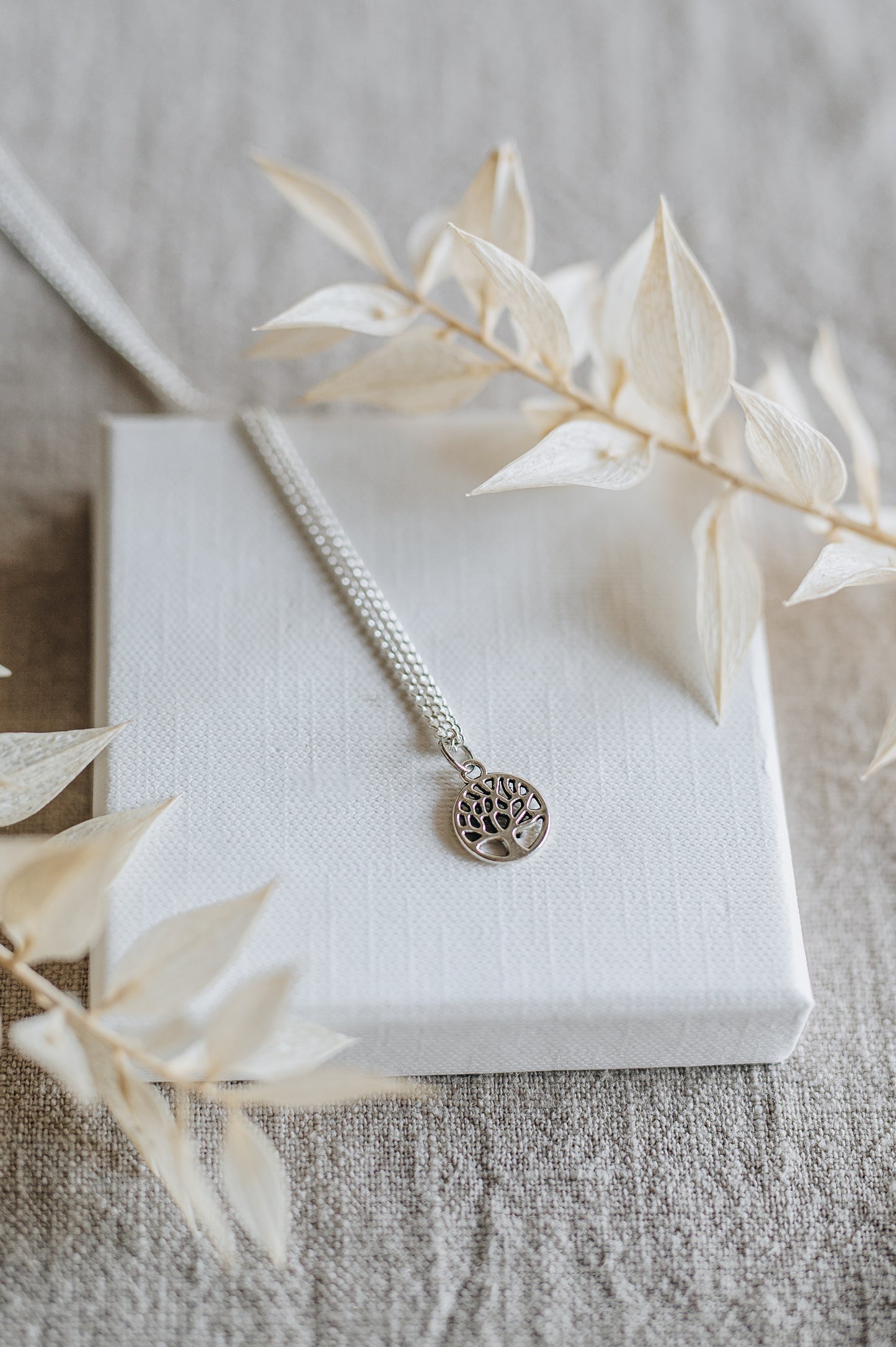 "Awake" necklace with tree of life pendant