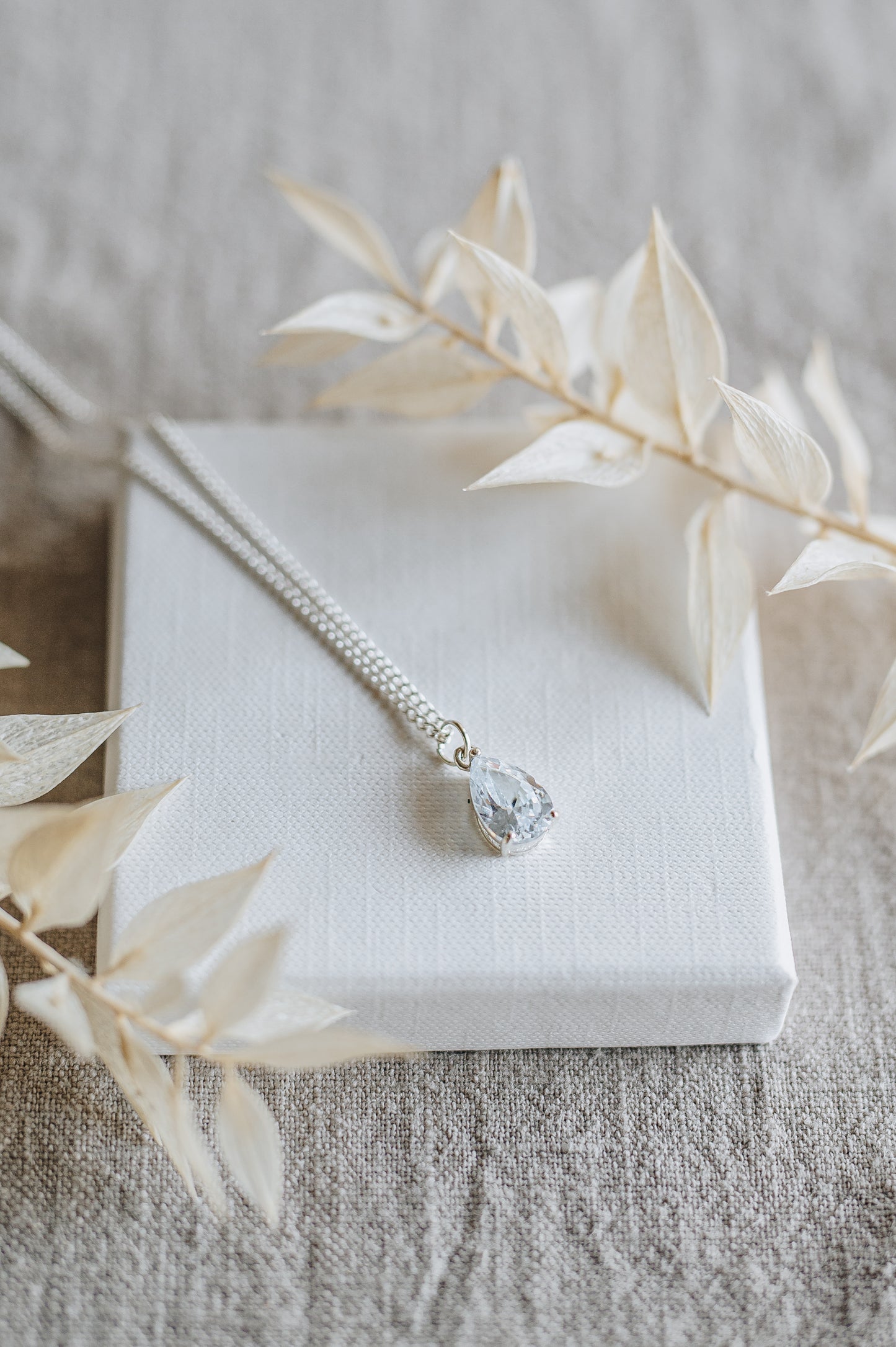 "Aether" necklace with rhinestone pendant